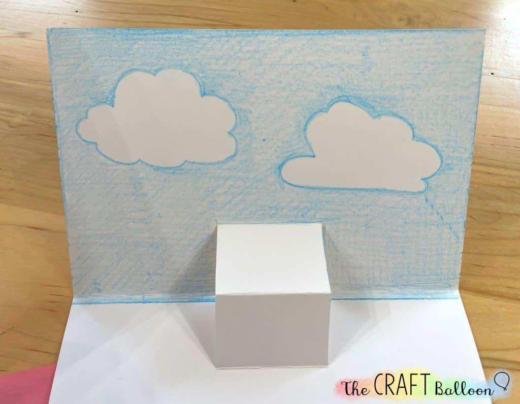 Pop up card with cloud and sky backdrop