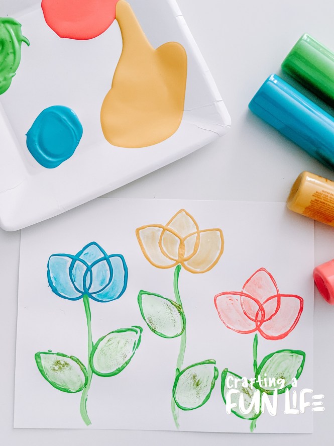 30 Spring Crafts and Activities for kids including butterfly life cycle paper plate craft, fizzy flower painting, flower suncatcher and so much more, tulip stamp art project for kids, spring crafts for kids