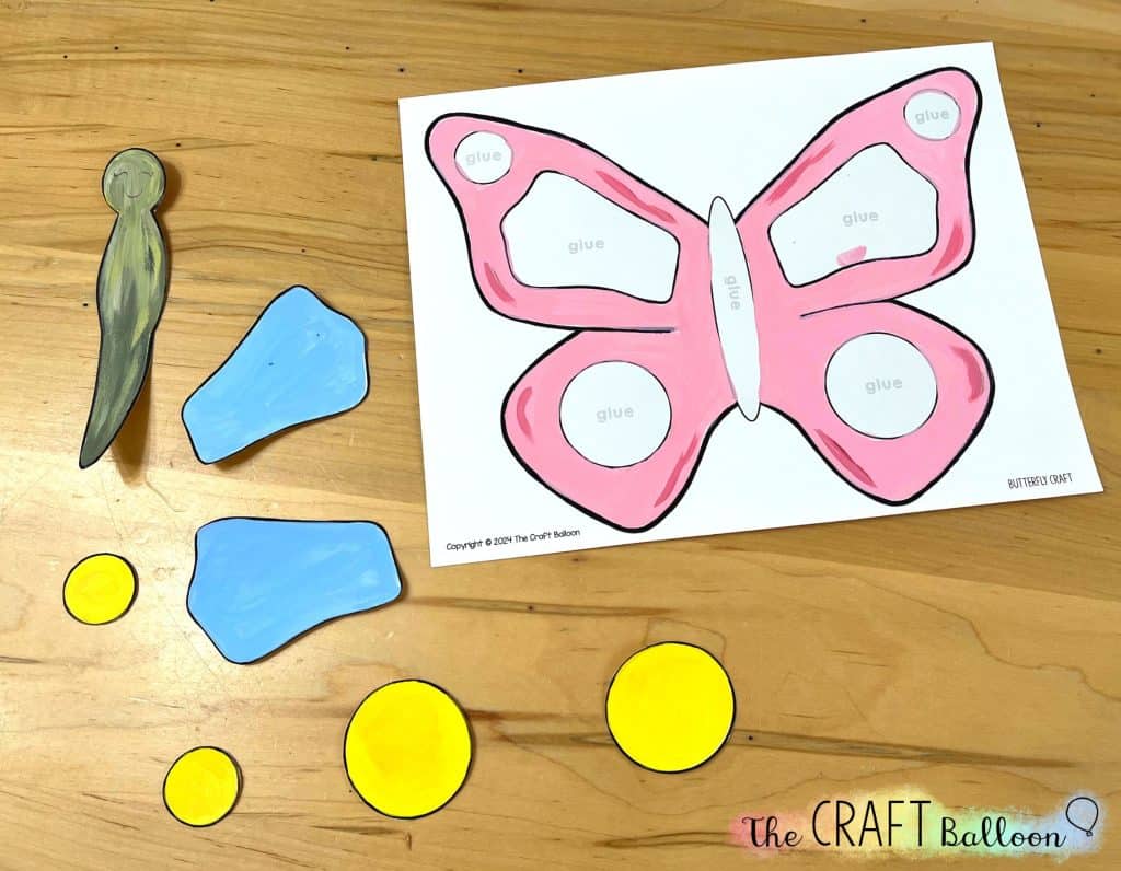 butterfly craft with cut-out parts ready to glue